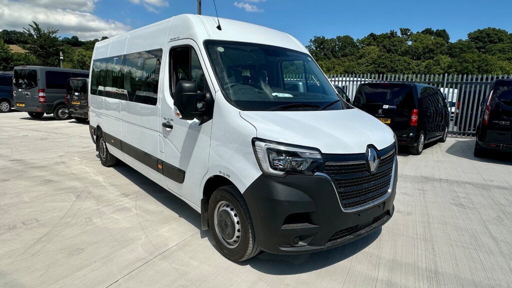 A parked white minibus,